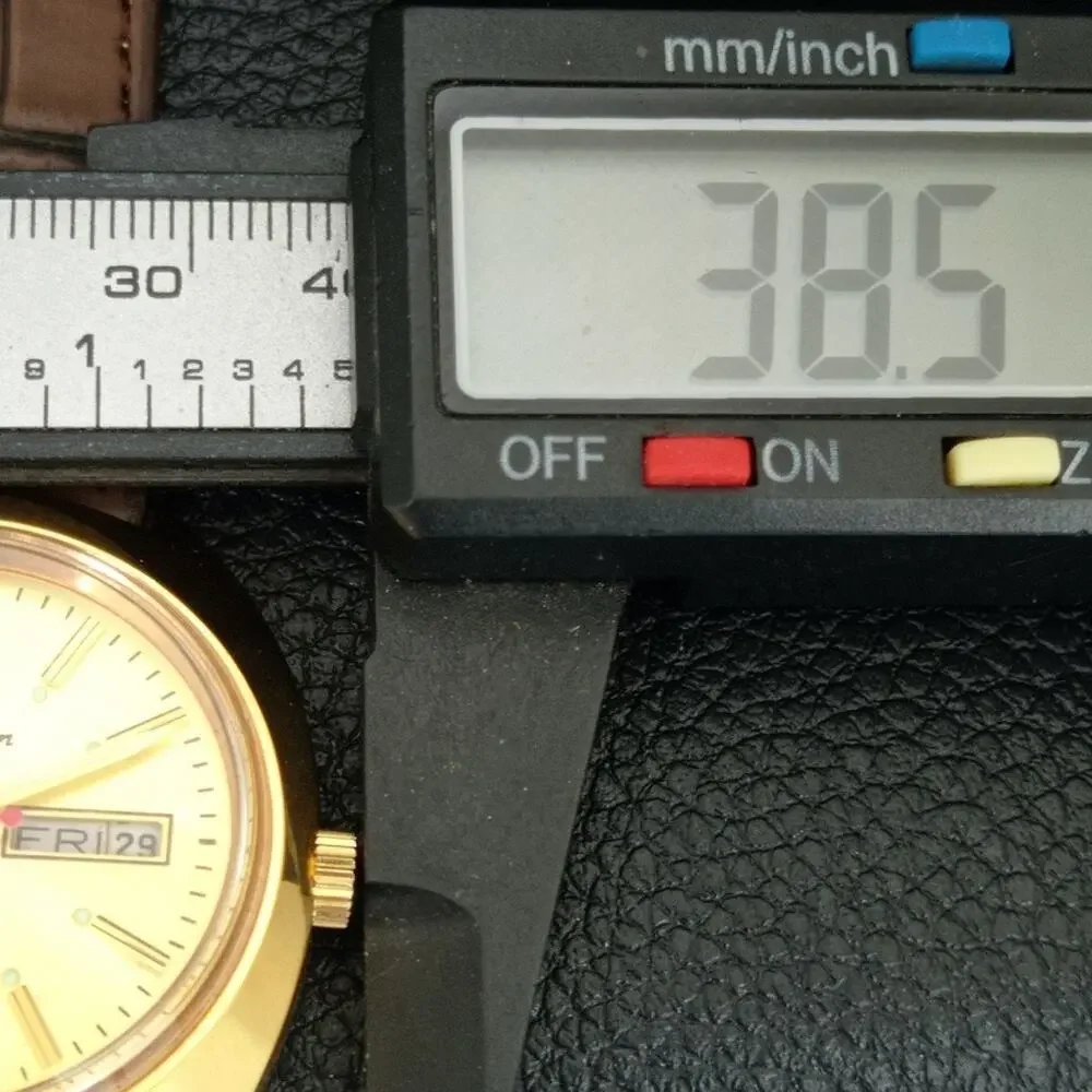Vintage 1976 HMT Automatic Wound Mens Gold Watch W/daydate & Red accents